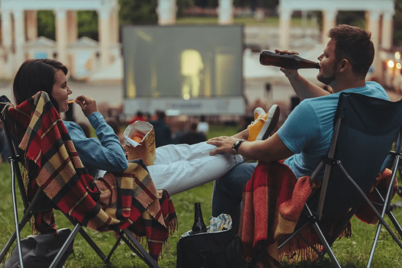 Couple At The Outdoor Movie Theater