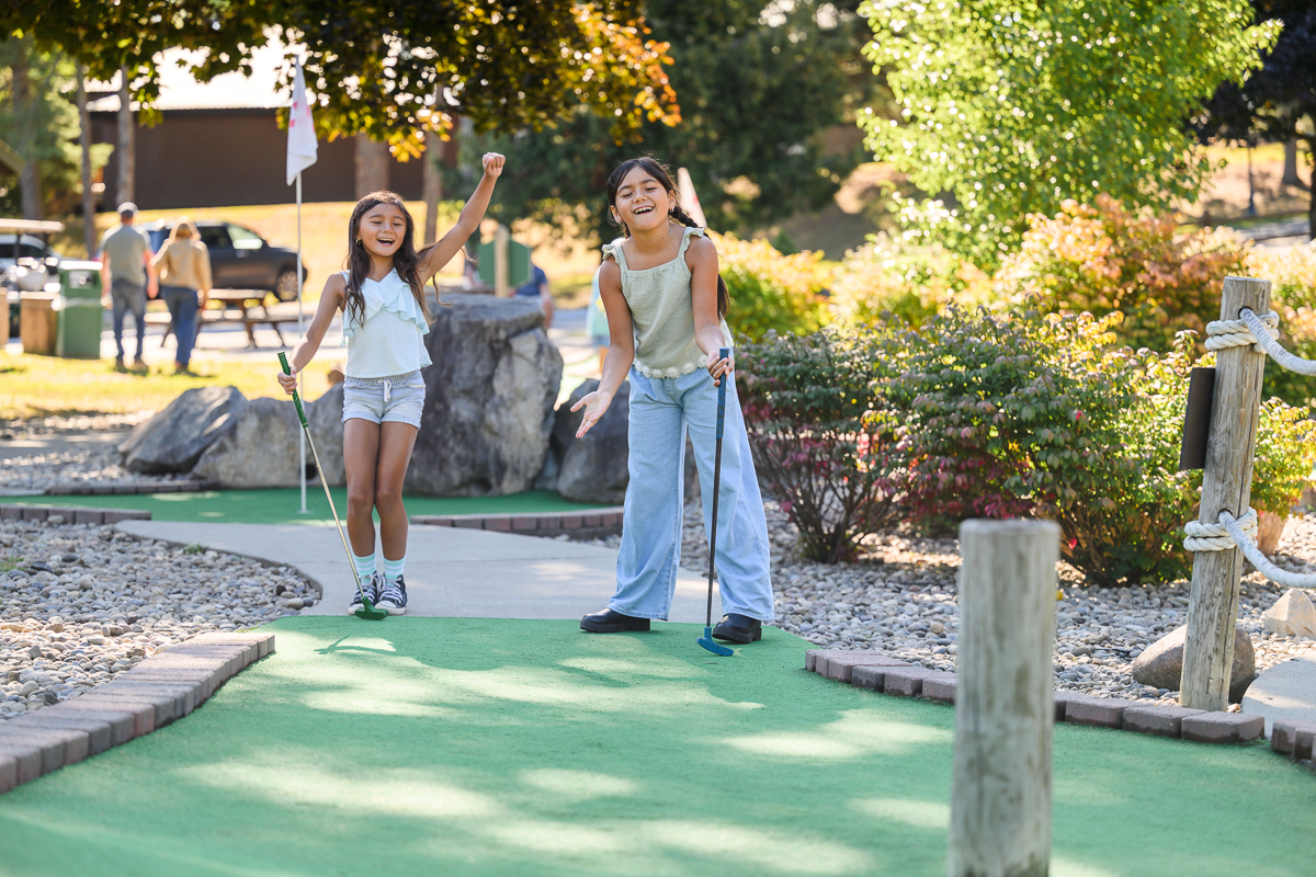 Kids Playing Mini Golf