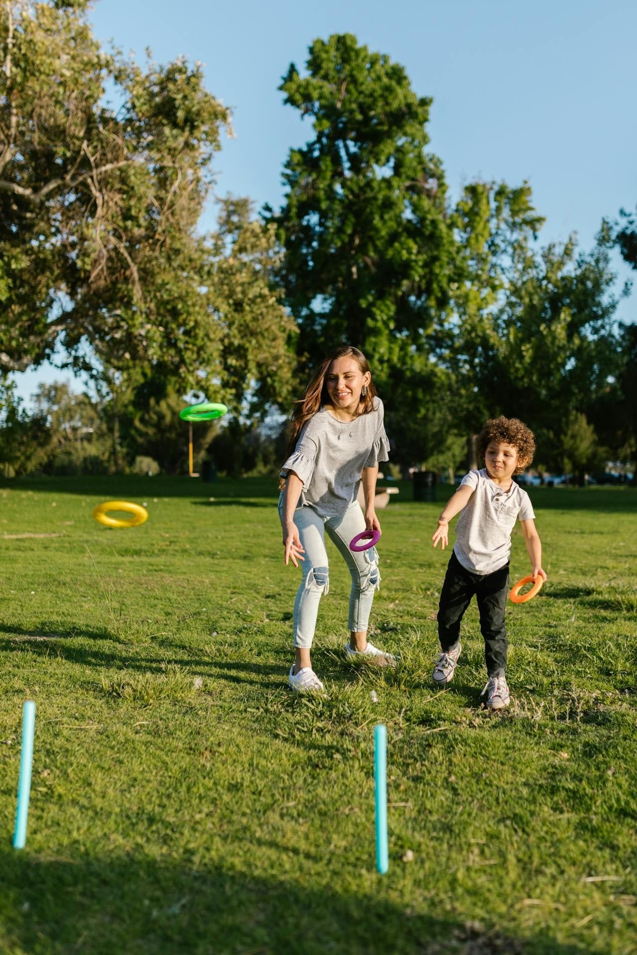 Woman And Child Playing Ring Toss