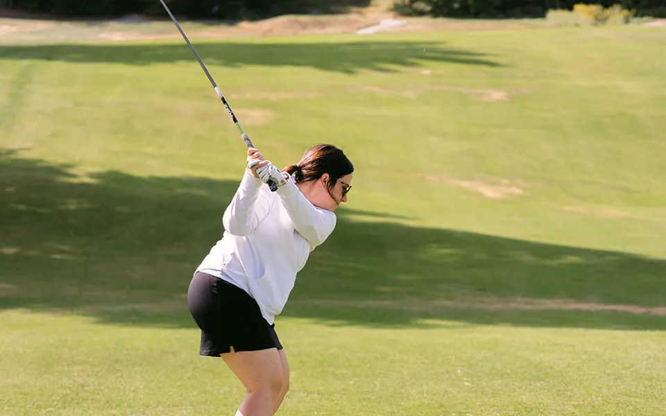 Woman Golfing